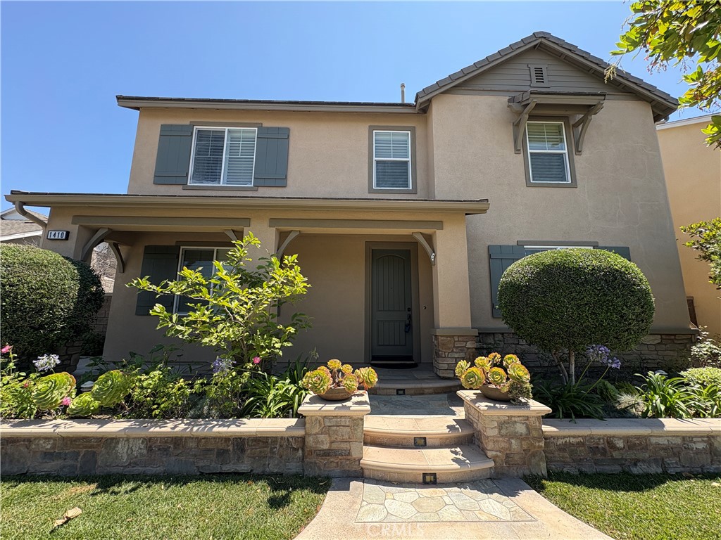 Welcome to this stunning five-bedroom, four-bathroom home nestled in the highly desirable Columbus Square community of Tustin. Boasting a spacious and thoughtfully designed floor plan, this home showcases high-end finishes and designer touches throughout. The gourmet kitchen features premium stainless steel appliances, granite countertops, and a large center island—perfect for cooking and entertaining. The expansive master suite includes a luxurious spa-like bathroom and a generous walk-in closet. Additional upscale features include custom cabinetry, hardwood flooring, recessed lighting, and elegant fixtures. The home comes complete with a washer, dryer, and refrigerator. Enjoy the beautifully landscaped backyard, ideal for relaxing or hosting guests. Located just minutes from shopping, dining, and with easy freeway access, this home also offers access to top-tier community amenities such as a resort-style pool, spa, clubhouse, and basketball courts—perfect for families and those who love to entertain.