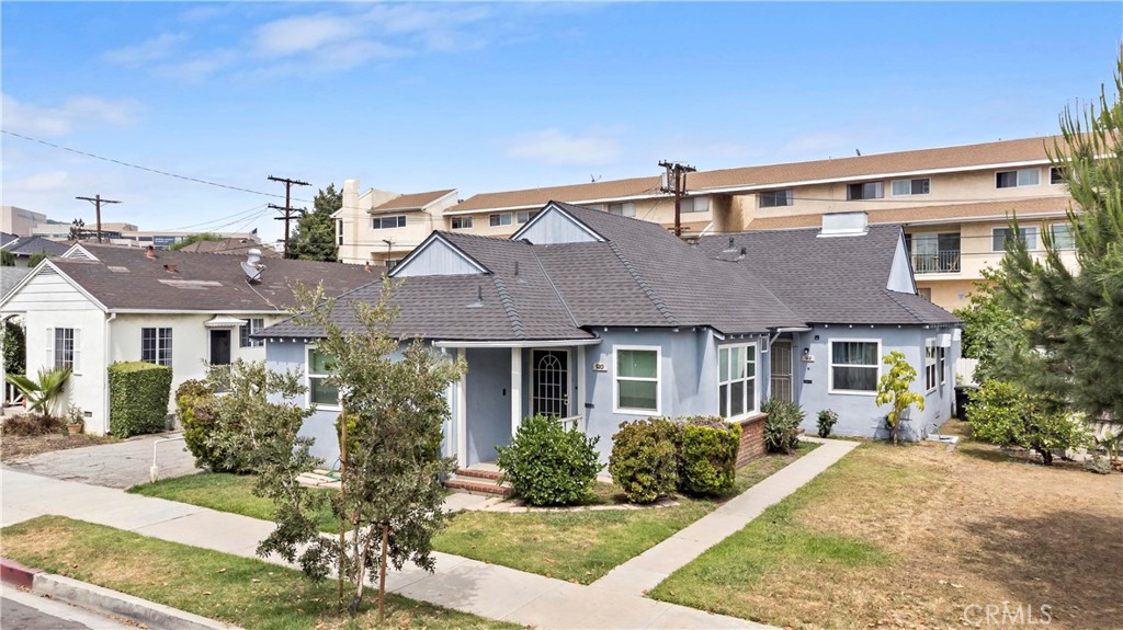 This charming 2-unit duplex is nestled in a highly sought-after neighborhood, just moments away from Glendale High School and Glenoaks elementary school. Enjoy convenient access to Americana shopping center, upcoming Erewhon Market, Whole Foods, Vons and major freeways, making commuting a breeze. Perfect for both owners and investors. A complete new roof was replaced in March 2025. The front unit was beautifully remodeled in 2022, featuring 1 bedroom, 1 bonus room, and 1 bathroom with newer laminated flooring throughout the living area and bedroom and new double pane windows. The updated kitchen showcases elegant granite countertops, while the renovated bathroom adds a modern touch. The rear unit offers 2 bedrooms and 1 bathroom, with hardwood flooring in the living room and bedrooms. Additional amenities include a long driveway with detached 2-car garage at rear as well as separate storage and laundry rooms. Separate electrical meters and separate gas meters. Please do not go onto property without a confirmed appointment, there are big dogs on the premises. Don't miss out this exceptional property!