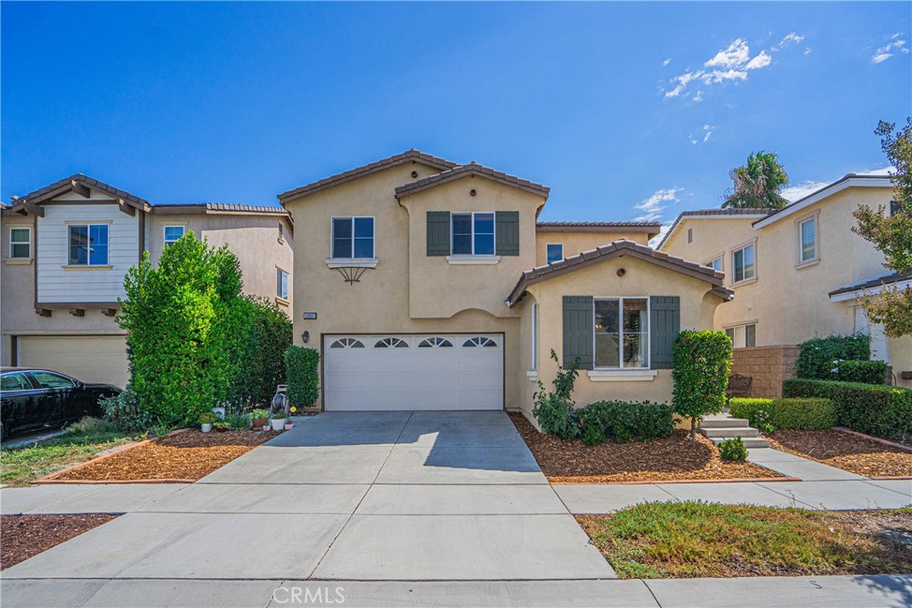 Absolutely gorgeous 3 bedroom 2.5 bathroom home located in the highly sought-after City of Eastvale. This open floor plan shows a specious useful place! As you enter the foyer you will feel right at cozy your place. The first living room which is right next to the front door is spacious with natural light and has been tastefully decorated. It can also be converted into a 4th bedroom if you need. You will find beautiful laminate wood flooring throughout the main level as well as detailed upgrades such as window coverings, light fixtures, crown molding, custom casing , shiplap, upgraded baseboards and designer paint. The powder room is adorable and has been completely remodeled from top to bottom a few years ago. The gourmet kitchen opens to the second living room and is perfectly appointed with stainless-steel appliances, granite countertops, walk-in pantry and a large beautiful island. Upstairs you will find a landing that leads to 3 cozy bedrooms. All the bedrooms have walk-in closets. The master bedroom features two sinks, separate tub and shower with an oversized walk in closet. The laundry room is conveniently located upstairs with enough storage space. The backyard is delightful and perfect for entertaining with a custom pergola and tranquil waterfall feature. You will want to stay forever! Low maintenance landscape. The community includes a pool, spa, BBQ area , playground. Walking distance to Elementary, middle, and high schools, sports parks, shopping centers and easy access to freeways. This home is waiting for your family!