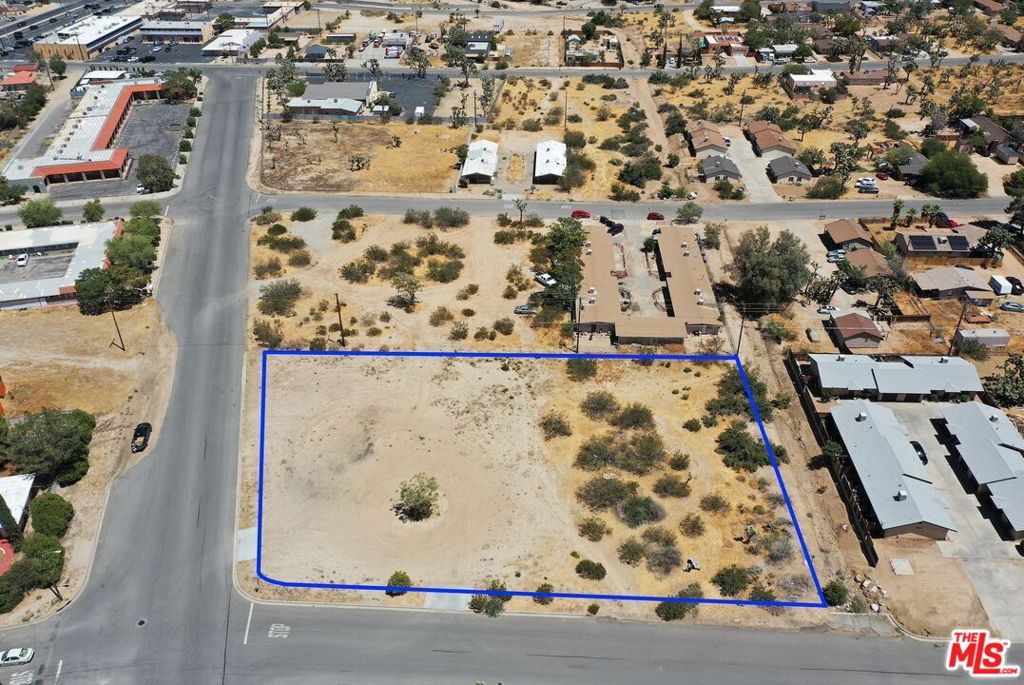 Development opportunity in prime Old Town Yucca Valley on one acre corner lot. 24 Units per acre! Lot Size appx 46,151 SF (lots combined). Sewer and waterin street. Property has curbs and drive aprons. Survey and hydrology report available. City has provided clear path to development through pre application process. Attractive commercial residential zoning allows a myriad of uses. The only thing you can't do with this lot is lose money! Look at all the possibilities the zoning permits by right, such as Broadcast and recording Studios, Community/Cultural Centers, Day Care Centers, Membership Lodges and Clubs, Private Schools & Colleges, Studios-Art, Dance, Music Photography, Universities/Colleges, Fitness Centers, Places of Worship, Theaters, Auditoriums, and Meeting Halls, Laboratories, Recycling Facilities, Marine & Motor Vehicle Sales/ Leasing, Libraries/Museums, Public Parking Lots/Structures, Parks & Recreation, Banks and Financial Services, Convalescent/Rest Homes, Laundromats, Self-Service and DryCleaning, Medical Services, Photocopy/Printing/Desktop Facilities, Propane/Liquid Fuel (Storage and Sales), Travel Agencies, Veterinarian Clinics and Animal Hospitals, Multiple Family Residential, Assisted Living Facilities, Condominiums/Townhomes, Live-Work Facilities, Mixed-Use Developments(Residential over Retail/Office), Residential Care Homes. Priced to sell. SUBMIT ALL OFFERS. SELLER IS OPEN TO FINANCING! Neighboring lot for sale as well.