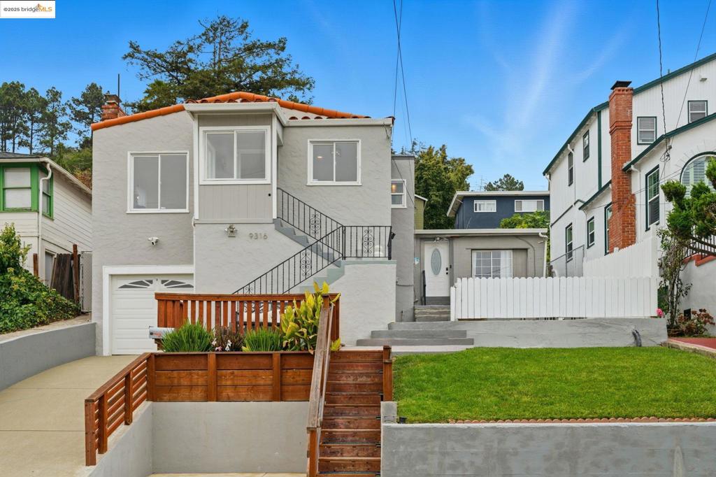 VIEWS, VIEWS, VIEWS! Love city views? Cozy up by the warm fireplace and take in the incredible bay panorama right from your living room. This charming home features a recently updated kitchen and beautiful hardwood floors throughout. Exceptional California-style indoor-outdoor living with an expansive upslope lot—complete with a 2nd bonus structure in the backyard (reportedly built in 1938, with historic vibes) and a detached laundry room. Entertaining and  relax- this yard offers more stunning city views that make this home truly special.   Attached garage, driveway plus additional parking pad. Don’t miss your chance to experience the best of comfort, style, and unbeatable views—all in one perfect home. Turnkey main home, incomplete ADU plus bonus structure in the back yard.  So much opportunity. See you at 2pm today for fresh cookies and hot apple cider.