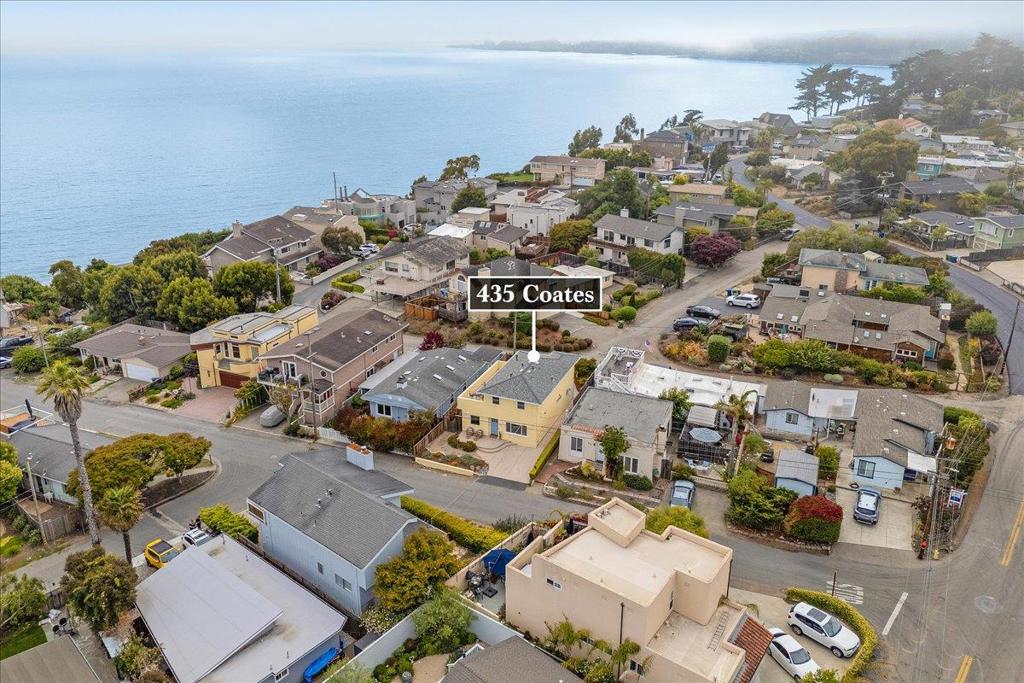 Enjoy effortless coastal living with blue ocean views from your new trex deck, accessed by your very own private ELEVATOR--a rare luxury in the heart of Seacliff. Whether you're sipping morning coffee above the waves or winding down with a sunset, this elevated lifestyle is all yours. Never pay for beach parking ever again! Just ten homes (2 min walk) from "neighborhood" beach access, this home is perfectly positioned to embrace the best of Aptos living. Stroll the scenic coastal cliffs or play fetch with the dog in the water. Treat yourself to a cone at Mariannes Ice Cream, or meet friends for tacos and margaritas at Manuels--all just minutes away! This beautifully renovated 2 bed, 2 full bath home also features a bonus room used as an office nook and has been upgraded from top to bottom: fresh stucco, a brand new 40-year roof, gutters, fresh paint, updated windows, new french doors, remodeled kitchen and bathroom, flooring, tankless water heater, and a serviced elevator just to name a few. In a neighborhood of charming beach cottages, the attached garage is VERY RARE and valuable bonus-many homes in Seacliff do not have one. With Nisene Marks State Park just a mile away, you can enjoy a morning at the beach and an afternoon in the redwoods all in one perfect day. Must See!