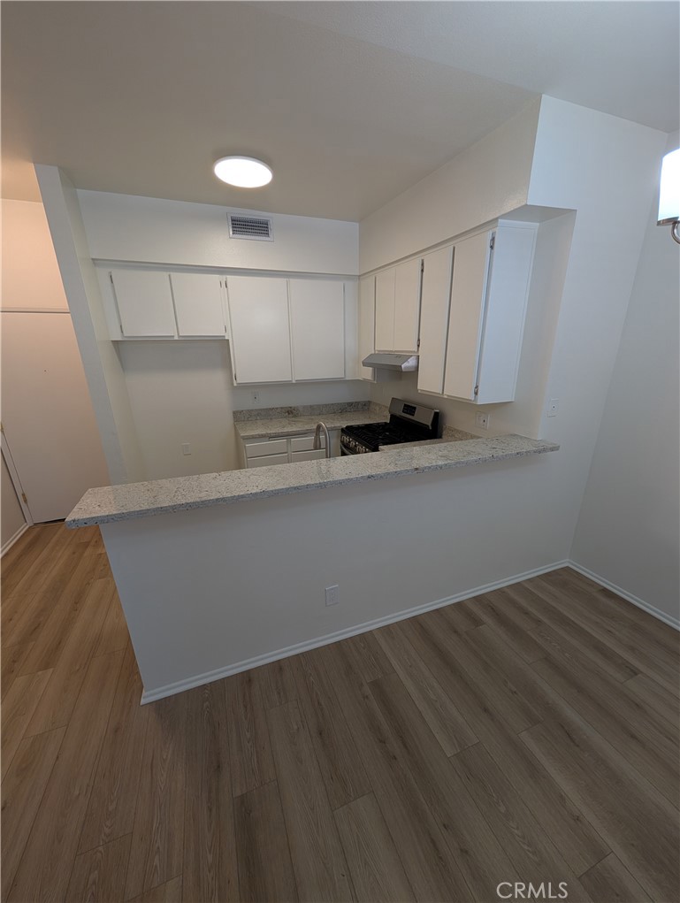 Renovated 2 bedroom 2 Full bath with central air and heat, and high ceilings a in a security building with two covered parking spots in garage. Fully renovated apartment with granite counters, large wood cabinets, central Heat/AC and faux wood flooring ideally located in Granada Hills. Features include Stainless steel appliances including refrigerator and dishwasher. This unit has wonderful light through its many windows and is in an upper corner with no one above or on two sides. To apply for this home use RentSpree at this link: https://apply.link/TaTgiyY.
Conveniently located within heart of Granada Hills and its many restaurants, coffee shops, and businesses and residences have the opportunity to attend Granada Hills Charter schools and CSUN campus is a short distance away too. Located in the North San Fernando Valley it's easy to commute to nearby offices, colleges, and universities from this apartment building.
*This unit has a Move-in Special and Promotional Rental Rate of $2,395 for the first 3 months and then the rent moves to $2,595 and is only valid for new tenant move-ins. Lease written at full rate for 12 months. Existing residents or tenants renewing their leases are not eligible for these specials. The management reserves the right to modify or terminate these specials at any time without prior notice. Move-in Specials cannot be combined with any other offers or promotions unless explicitly stated. All specials are subject to availability and approval of the application.