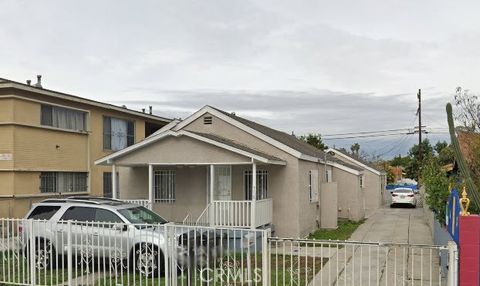 Photo of 715 E 87th Place, Los Angeles, CA 90002 (MLS # PW26025169)
