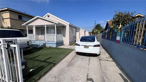 Photo of 715 E 87th Place, Los Angeles, CA 90002 (MLS # PW26025169)