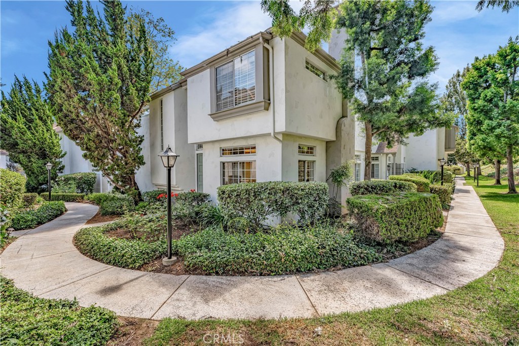 Discover coastal living at its best—just 8 minutes from the best beaches in South Orange County and surrounded by amazing hiking trails. This Hampton Village home is the largest model at 1,303 sq. ft., set in one of the most private locations in the community with a beautiful greenbelt backdrop.
Inside, you’ll find 2 spacious primary suites and 2.5 bathrooms, freshly updated with new interior paint, crisp baseboards, updated flooring, and plantation shutters. Comfort is ensured year-round with a whole-home water filtration system and a newer AC and heating system. The kitchen, complete with stainless steel appliances, flows easily into the dining and living areas, creating a warm and inviting space for everyday living.
Upstairs, both bedrooms are privately positioned on opposite sides of the home, each with its own full bath and walk-in closets—perfect for families, roommates, or guests. Downstairs, a convenient powder room and open living spaces lead to a charming private patio with low-maintenance vinyl fencing, ideal for outdoor relaxation or entertaining.
Just steps away from shopping, dining, and everyday conveniences like Albertsons, Starbucks, and local restaurants, this home is also within award-winning schools (per GreatSchools.org). The Hampton Village community offers a sparkling, newly renovated pool and spa, giving you a resort-style escape right at home.
With its ideal location, spacious layout, and rare privacy, this home truly has it all.