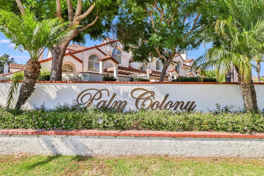 Nestled within the desirable Palm Colony community, this enviable corner unit featuring two Primary Suites and a versatile downstairs bedroom/office radiates sophistication and pride of ownership. The ground floor bedroom with a full bath is perfect for guests, a home office, or multigenerational living. The beautifully updated kitchen offers ample cabinetry and striking quartz countertops, seamlessly flowing into the dining and living areas, where you’ll find a cozy fireplace, wet bar, and easy access to the oversized front patio and private side patio—ideal for entertaining.
The home showcases new flooring throughout and has been freshly painted, creating a light and modern feel. A split staircase leads to two spacious primary suites, each with its own en-suite bathroom. The main primary suite is a true retreat, complete with a second fireplace, expansive balcony, and generous walk-in closet.
Enjoy the convenience of a direct-access 2-car garage, ample guest parking right outside, and resort-style amenities including two tennis courts, indoor racquetball, a sparkling pool and spa, and a fully equipped gym. Prime location with immediate access to the 101 and just moments from Starbucks, Ralphs, restaurants, and more. The gated entry provides peace of mind, while lush greenbelts surround the community. RV and boat parking available. Don’t miss this exceptional property!