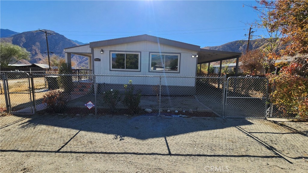 For Sale, Manufactured home with its own land. Yes, the land is included with this remodeled manufactured home on permanent foundation. Paid off solar panels to save you money on your electric bill. Convenient Location , located just off the 10 freeway across from the Casino and Outlet Stores. The home was just remodeled. It has new flooring, new kitchen cabinets, new bathroom cabinets. Spacious kitchen with an island, quartz counter-tops, new stove. new hood, new sink & faucets. The hall bathroom has a shower/tub combo. The primary bathroom has a separate tub and stand up shower. Indoor Laundry room. Covered carport on on side that fits several cars. Covered patio on the other side along the main entrance. The lot is fully fenced and has lots of space in the side and back yard. Some photos have been virtually staged; home is not furnished. Come and take a look.