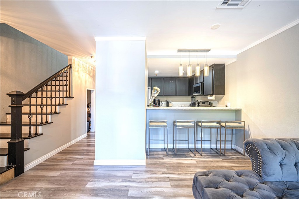 This beautifully remodeled townhome located in a gated ccommunity in the heart of Paramount offers a perfect blend of style and comfort, featuring modern light fixtures, stainless steel appliances, custom interior paint, elegant wood laminate flooring, and vaulted ceilings that create a spacious, airy feel. Dual-pane windows and sliders fill the home with natural light, while a large private outdoor patio balcony provides an ideal space for relaxing or entertaining.
Recently renovated just a few years ago, the home also includes two subterranean parking spaces, low HOA dues, and access to a community pool and spa — making it a turnkey opportunity in a desirable location.
Be sure to check out hte 360° Virtual Tour and Call to schedule an appointment Today!