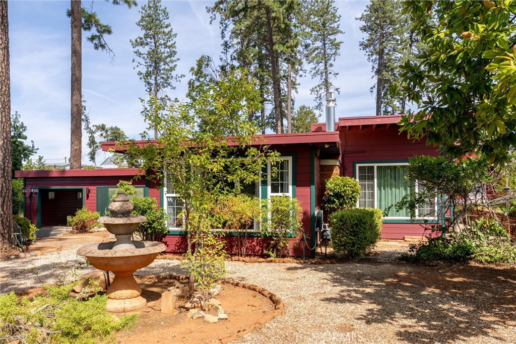 Updated Mid-Century Modern in the Heart of Paradise!
Discover this stylish and well-maintained mid-century modern gem offering 2 bedrooms, 1 bathroom, and approx. 1,093 SqFt of living space, perfectly situated on a generous .34-acre lot. Blending classic charm with thoughtful updates, this property delivers both comfort and character in one of Paradise’s most convenient locations.
Step outside and experience true indoor-outdoor living with the covered 637± SqFt outdoor retreat, complete with a soaring tongue-and-groove ceiling and impressive 14-foot hickory bar—an entertainer’s dream for watching the game, hosting friends, or simply enjoying peaceful evenings.
Additional highlights include: ??? Tuff Shed Overview Base Dimensions: 12' x 16' Porch: 4' extension, making the total footprint 12' x 20' Total Square Footage: 288 sq ft Lower Level: 192 sq ft Loft: 96 sq ft Included Features: Built-in shelving Benches Tool board, Newer commercial-grade roofing for long-lasting durability, Fully landscaped and treated yard featuring shrubs, colorful flowers, and a delightful collection of fruit trees (lemon, quince, and orange), alongside mature native pines. Take a look at this exceptional home today..
Newer septic system for peace of mind
Centrally located between Skyway and Clark Road, this home offers easy access for commuting to Chico, Oroville, and beyond while keeping you close to local conveniences. Plus, living in Paradise means endless opportunities for recreation—whether it’s hiking, biking, kayaking, watersports, or exploring the local recreation trail, there’s always something to enjoy in the great outdoors.
Don’t miss your chance to own this outstanding property that blends timeless design, modern upgrades, and resort-style outdoor living—all in the heart of Paradise!