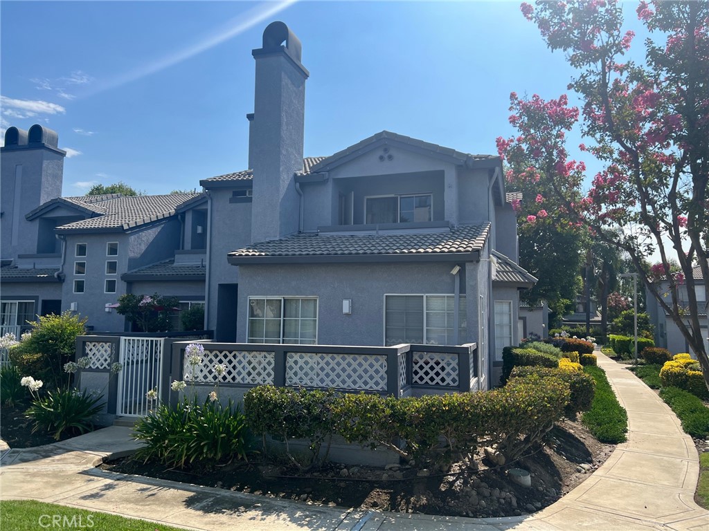 This 3-bedroom, 2.5-bathroom and 2 car attached garage Townhouse is now available. Large living features a decorative fireplace and sliding doors that lead to the cozy patio. Kitchen has tile counter tops, pantry and includes stove-top/oven, microwave and dishwasher appliances. The primary bedroom has a large closet, sliding doors that lead to a balcony and private bathroom with dual sinks. The other 2 bedrooms are very spacious and offer plenty of closet storage space. Washer and dryer are located in the garage. Community pool and jacuzzi available. This property is located near restaurants, grocery stores and many shopping plazas.