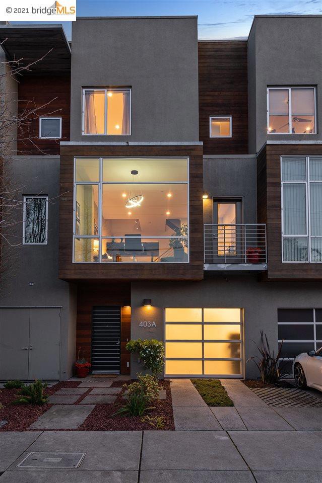 Sleek, spacious, light-filled, modern townhome in the heart of Temescal. Soaring ceilings, central skylight, and huge picture window fill the space with abundant light and views of the Berkeley/Oakland hills. Built in 2006 with modern concrete construction. Freshly painted in designer colors, polished bamboo floors and steel stair case railings add to the urban loft feel. You’ll love cooking in the remodeled kitchen with high end fixtures and SS appliances and a large window over the wide undermount sink. Three ensuite bedrooms, one on the ground level has a Murphy bed and looks out to the private back garden ideal for BBQ, gardening or socializing. It also makes a great home office, guest room or home gym. Two more spacious bedrooms on the top floor each with ample closets and their own full bath. Walk score 96 bike score 98. Great location near Rockridge, Temescal and Piedmont Ave. BART, transbay bus & freeway access. You CAN have it all. https://TemescalTownhome.com/mls