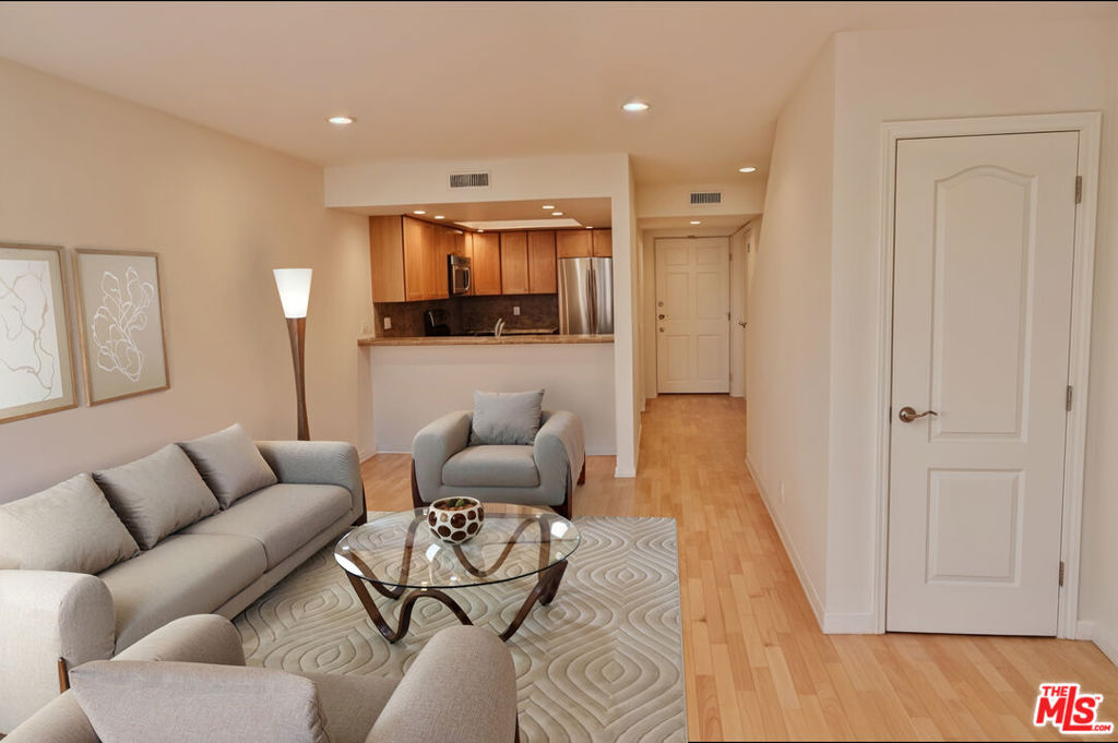 Two story townhome style condo in the heart of Playa del Rey, just 4 blocks to the sand. This comfortable 2 Bedroom + 2 Bath End unit with balconies off both the first and second floors facing downtown Playa del Rey, wetlands and Marina del Rey--great for watching Fireworks on the 4th of July. The property features a fireplace, eat at bar in kitchen, in unit w/d, skylights, jetted bathtub in primary suite, and hardwood floors throughout. Includes one car gated parking. Conveniently close to airport, freeways, Marina del Rey and SouthBay.