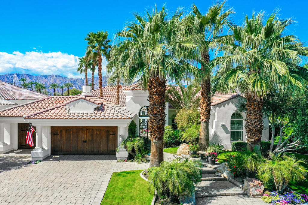 Experience the epitome of luxury living in this exquisite estate home nestled within the prestigious Mountain View Country Club. Offering breathtaking views of the majestic mountains, serene lake, and picturesque golf course, this idyllic setting is perfect for any occasion. Indulge in the beauty of nature as you savor your morning coffee on the patio and unwind in the evening in front of the warm and inviting courtyard fireplace. Situated on an elevated lot overlooking the Santa Rosa Mountains. Golf membership is available for transfer.This magnificent home has undergone a complete renovation with a gorgeous chef's kitchen and the meticulous attention to detail is evident throughout. The well-designed floor plan encompasses a den/office, perfect for those who work from home or require a quiet space for reflection. With 4.5 luxurious baths, every convenience and comfort has been considered. This exceptional property boasts a total of four spacious bedrooms, ensuring ample space for family and guests. In addition to the main home, there is a separate casita, with an outstanding full kitchen providing a private retreat. Your private casita is just steps away from the refreshing private pool and spa, where they can soak up the California sunshine and relax in absolute tranquility. The perfect vacation home for you!For those seeking an active lifestyle, Mountain View Country Club offers both Golf and Social memberships. With a lease of 30 days or longer, these memberships