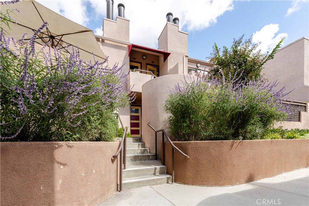 Below-Market Opportunity in Le Parc, Lake Forest — Move-In Ready 2-Bedroom with Garage!
Welcome to Le Parc, one of Lake Forest’s most desirable communities known for its contemporary design, serene waterfalls, and resort-style amenities. This beautifully upgraded condo is priced below market — and it’s not expected to last long.
Step inside to nearly 900 square feet of modern living space and one of the most sought-after layouts in the complex. The home showcases a redesigned kitchen with upgraded cabinets, full-extension drawers, a breakfast bar, and a new stainless steel microwave as well as travertine flooring throughout.
The open-concept floor plan feels light and spacious, with soaring ceilings and a natural flow between the kitchen, dining, and living areas. The primary suite includes a walk-in closet, an updated bathroom with a large vanity and ample storage, and a convenient in-unit laundry closet.
Upstairs, you’ll find a bright loft with a closet — perfect for a second bedroom, guest room, or home office. Step outside to not one but two private balconies: one off the living room and a large entertainer’s rooftop deck upstairs, where you can unwind among treetop views and the tranquil sounds of the community waterfall.
Additional notable features include air conditioning (installed in approx. 2021), a detached private one-car garage, and a prime, quiet location close to the pool and spa.
Le Parc offers three pool and spa areas, lush landscaping, and a peaceful setting that feels like a private retreat — yet it’s just minutes from shopping, dining, and major freeways. The HOA dues here also include water and trash. There's also a beautiful park up the street, Rimgate Park, with playground, basketball, tennis and picnic areas. 
With its below-market pricing, turnkey upgrades, and ideal location, this condo is perfect for first-time buyers, downsizers, or investors. An incredible value in today’s market — and sure to go fast!