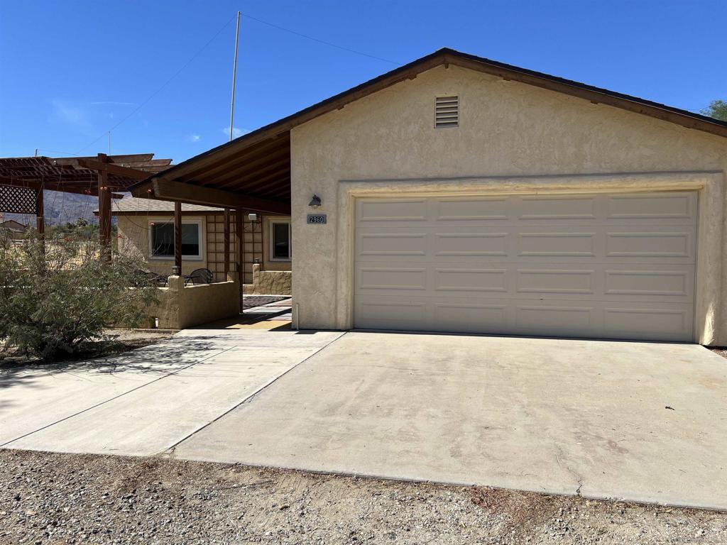 This 3BR 2BA home has been lovingly renovated by the seller. Dual pane windows, tile and carpet floors. Kitchen backsplash is tile, propane stove. Upgraded blinds. 2 car finished garage with work benches and shelving. Front porch has concrete sections and a patio framed cover. Back patio area has pony walls and open views to the west. .47 acre lot on this parcel. Newer roofs. Borrego Springs is one of only a handful of International Dark Sky Communities in the world. Borrego Springs is located in the low desert unincorporated area of northeastern San Diego County. Borrego Springs is a winter resort destination and we welcome the "snow birds" who arrive from colder climates to warm up during the winter. Borrego Springs is less than a 2 hour drive from San Diego or Palm Springs. Borrego Springs is a village within a park, completely surrounded and protected by the Anza-Borrego Desert State Park, is the largest desert state park in the contiguous United States with over 660,000 acres. This desert community is miles away from the nearest stoplight and we have no big box or chain stores. The slower uncomplicated pace and the scenic beauty, add to your rustic, authentic, desert experience. It is a special place, in all seasons. Activities include, nature walks, off-roading, hiking, biking, watching the wildlife, photography or star gazing. Borrego Springs is an active community for young and old alike with a desirable small town atmosphere. The elevation of the Borrego Valley Airport is approximately 520'. The summers are very hot, the winters are wonderful, spring is delightful and fall is not too bad either.