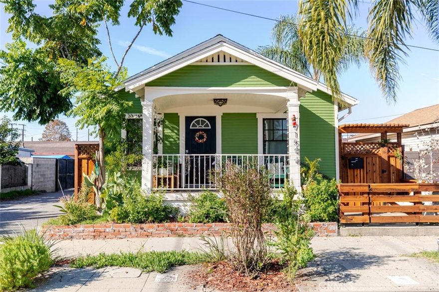 Welcome to this charming and thoughtfully updated single story home offering 2 bedrooms and 1 bathroom, located in the Highland Park area of Los Angeles. This residence features a bright and welcoming interior with wood style flooring, abundant natural light, and a functional open layout ideal for everyday living.

The kitchen offers white cabinetry, butcher block style countertops, stainless steel appliances, and a center island that connects seamlessly to the living space. Both bedrooms are well sized and provide flexibility for sleeping, home office, or creative use. The bathroom is clean and updated with modern finishes and a tiled shower.

A dedicated laundry area adds everyday convenience, along with ceiling fans, recessed lighting, and ample storage throughout the home.

The exterior spaces are a standout feature, including a covered front porch and a beautifully designed private backyard with an expansive deck, multiple seating areas, string lighting, and mature landscaping that creates a peaceful outdoor setting ideal for entertaining or relaxing. A gated entry and fenced yard provide added privacy.

Conveniently located near local dining, shopping, parks, and neighborhood amenities, this Highland Park home offers character, comfort, and inviting outdoor living in a desirable Los Angeles location.