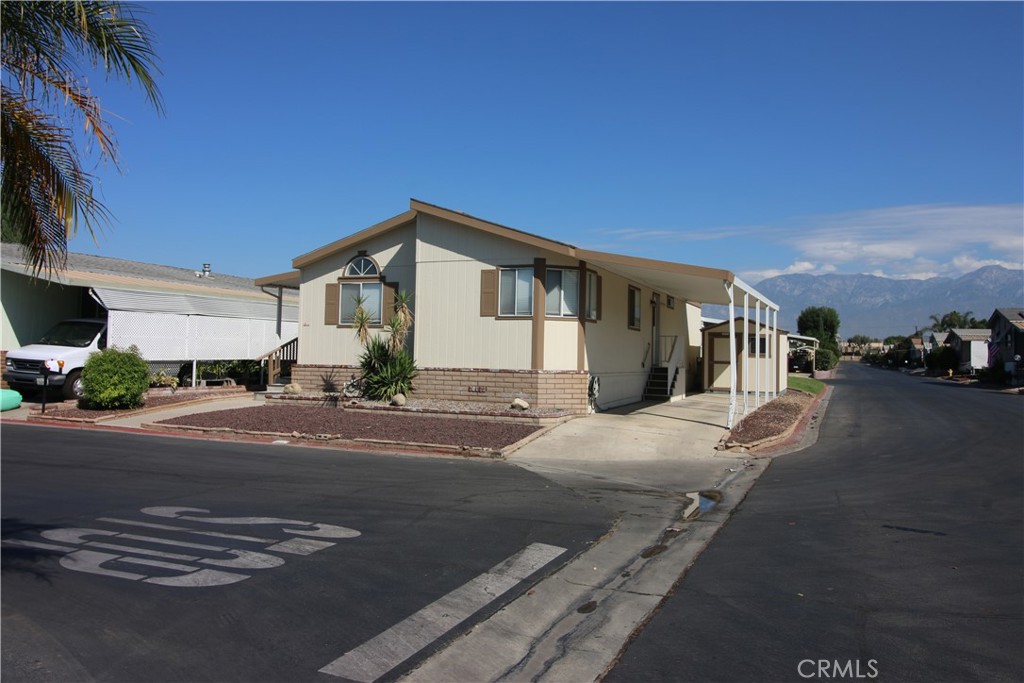 Nice 3 bedroom 2 bath unit with 2 car carport fresh paint, remodeled hall shower. Nice laminate flooring. Tons of kitchen cabinet space with pantry. Great park with tons of amenities like Pool, Clubhouse, Pickleball courts, dog park area. BBQ area. in a gated community.