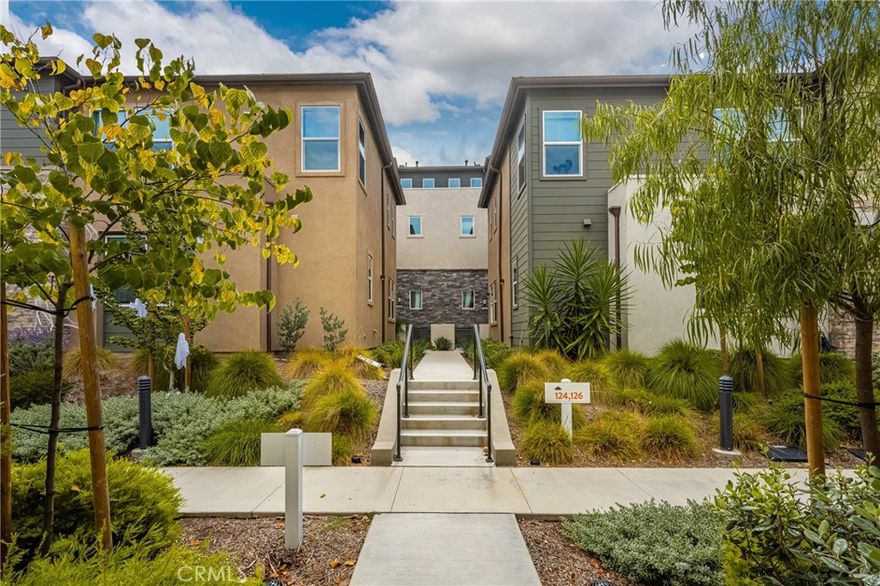 Welcome to 126 Sash, the best value condominium featuring one of the most sought after floor plans in Irvine’s vibrant Great Park community. This contemporary tri-level home blends modern design with functional living, offering approximately 2,147 sq ft with 3 bedrooms and 3.5 bathrooms. The spacious open concept kitchen and living area is perfect for entertaining, highlighted by a large quartz island and smart stainless steel appliances.  Enjoy indoor-outdoor living with a generous balcony off the living space, ideal for relaxing or entertaining. A private first floor bedroom with en-suite bath is perfect for guests or multigenerational living, while the third level features the primary suite with walk-in closet, oversized shower and a soaking tub. A secondary bedroom with full bath, and a convenient laundry room complete the upper floor. Additional upgrades include whole-home water filtration, a Ring security system, custom top- down bottom-up cellular shades, and leased solar panels for added efficiency.  Enjoy resort-style amenities including a  park, pools, fire-pit and a BBQ area— all with only one low HOA dues and access to award winning Irvine Unified schools, including Portola High School and Solis Park K-8. Don’t miss this rare opportunity to own a stunning modern home in one of Irvine’s most desirable communities.