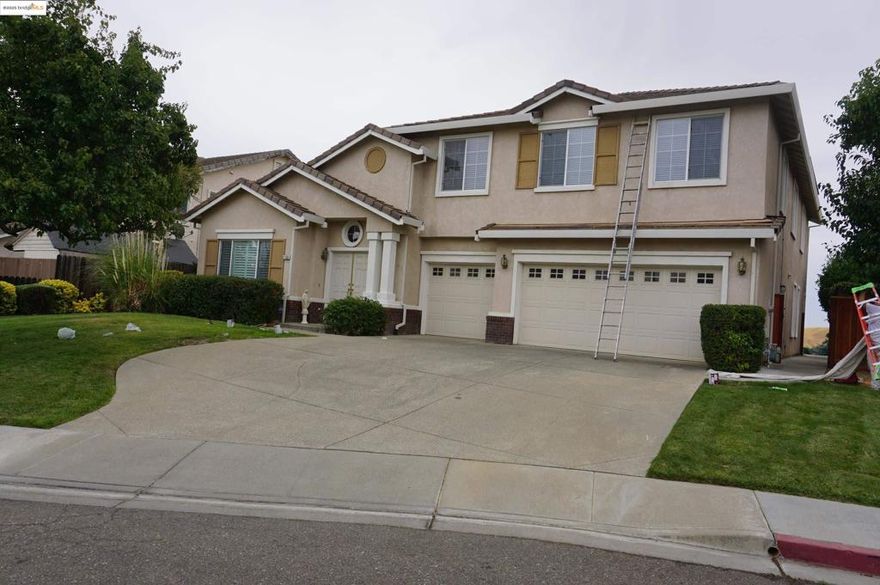 This is a spacious, comtemporay residence offering a luxurious feel with one of the largest floor plans in the community. The large Master Bedroomis downstairs. Privacy plus at the end of a quiet court which backs to the Antioch hills.  The backyard offers an inground pool and spa with views of the hills. The home has solar,  Upstairs there's a large bonus room with a wet bar.  This home is an entertainers delight.  Additional space for 7th bedroom upstairs