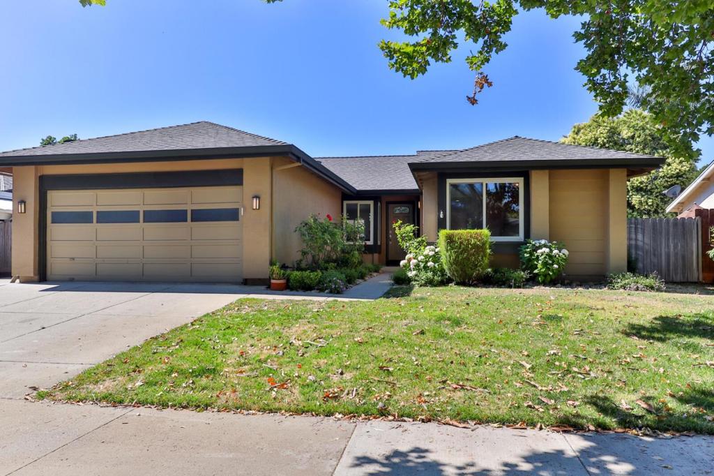 Welcome to your new home in the charming city of Gilroy! This inviting single story residence with soon to be owned Tesla Solar (the balance will be paid off in escrow) offers 3 bedrooms and 2 full bathrooms. The kitchen is a chef's delight, featuring quartz countertops, a built-in oven range with gas, a dishwasher, a microwave, and a refrigerator. The layout includes a kitchen and family room combo, perfect for entertaining, with a dining/living room combo and a breakfast bar in the kitchen. Enjoy comfort throughout the year with central AC and a central forced air heating system. The flooring is a mix of carpet and laminate, providing a warm and welcoming atmosphere. The living area boasts a vaulted ceiling, adding to the sense of space and light. Relax by the fireplace on cooler evenings. For convenience, the laundry is located in the garage, which houses a washer and dryer. The property also includes a two-car garage and an inviting pool/spa combo for outdoor enjoyment. This home is located within the Gilroy Unified Elementary School District. Near all amenities. This area is a dog walker's delight with tree lined streets and the bike/ hiking path at Christmas Hill Park just minutes away. Don't miss the opportunity to make this your new home!