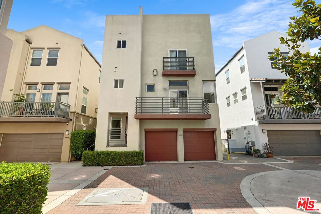 Experience contemporary coastal living in this stylish 3 bedroom + loft, 3.5 bathroom single-family home, ideally located in a quiet cul-de-sac within Playa Vista's highly sought-after Matisse community. Spanning three levels, this residence effortlessly combines modern design, functionality, and comfort perfect for those seeking an elevated, yet vibrant lifestyle. The sunlit, open-concept main level features spacious living and dining areas designed for entertaining and everyday living. Upstairs, you'll find two generous bedrooms, including a well-appointed primary suite, while the first floor offers a third bedroom with direct access to a large private backyard complete with a deck and low-maintenance turf ideal for outdoor relaxation or hosting guests. A versatile loft adds flexible space for a home office, gym, or media room. The private 2-car garage and prime Playa Vista location round out the appeal. Just one block from Concert Park and its popular shoppes, and moments from Runway retail, Whole Foods, restaurants, theater, and more. Enjoy access to world-class community amenities including The Resort and CenterPointe Club with pools, fitness centers, and recreation all within walking distance. Plus, you're close to Silicon Beach tech hubs, making this a rare opportunity in one of LA's most dynamic neighborhoods.