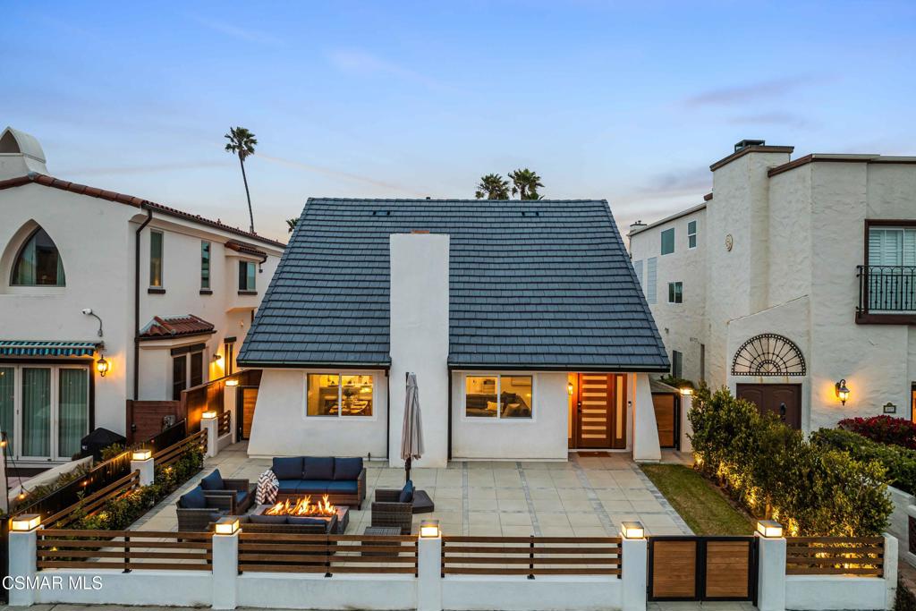 Welcome to the ultimate in beachside living at 5113 Whitecap Street--just moments from the sand in the highly sought-after Oxnard Shores community. This fully remodeled 3-bedroom, 3.5-bath coastal retreat has been thoughtfully transformed with luxurious finishes, timeless design, and all the modern upgrades you could ask for.The spacious primary suite is located on the main level, offering a beautifully renovated ensuite bathroom and ultimate privacy. Upstairs, two additional bedrooms each feature their own ensuite bathrooms, perfect for family, guests, or a dedicated home office. One of the upstairs bedrooms opens to an expansive private deck through a dramatic oversized slider--an ideal space to relax under the sun or entertain beneath the stars.Inside, the home boasts stunning engineered wood flooring throughout, smooth new natural plaster walls, recessed LED lighting with dimmer switches, and custom window shades on every window. The heart of the home is the open-concept great room and dining area, centered around a striking marble fireplace with an automatic switch for effortless comfort. The remodeled kitchen is truly a chef's dream, featuring natural honed quartzite countertops, all-new custom cabinetry, a top-of-the-line Wolf range, Sub-Zero refrigerator, farmhouse-style sink, and a stylish mini bar with a wine fridge and accent lighting. The home is also wired for whole-house audio, creating the perfect environment for entertaining or relaxing.Every detail has been considered, including all new windows and sliders, a brand-new heating and air conditioning system, and built-in closet systems in every bedroom, complete with quartz-topped dressers and shelving. Outdoors, enjoy low-maintenance landscaping illuminated with landscape lighting and additional accent lights, a cozy firepit, a new concrete driveway with elegant pavers, and direct access to an oversized garage with an epoxied floor. There's also convenient RV parking on one side and two-car parking on the other, along with a dedicated laundry area that includes full hookups and a utility sink. The home is even pre-wired for outdoor security cameras, offering peace of mind along with unparalleled style.From the new roof to the freshly painted interior and exterior, this home has been completely refreshed and reimagined with no detail overlooked. Whether you're looking for a permanent coastal haven or the ultimate weekend escape, 5113 Whitecap Street offers the very best of California beach living--effortless, elegant, and just steps from the shore.