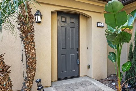Photo of 117 Silverado, Irvine, CA 92618 (MLS # SW26057955)
