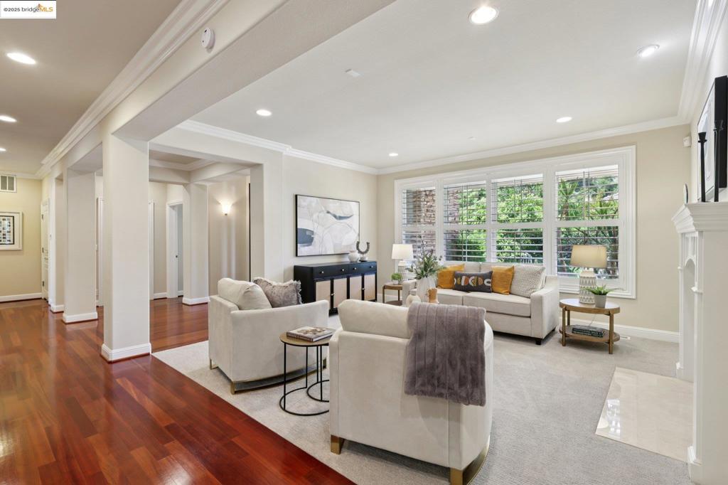 Tucked away on a premier cul-de-sac in one of Alamo’s most sought-after neighborhoods, 125 Mystic Place is a grand, move-in-ready estate offering 4,661 square feet of refined living space on approximately 1.67 acres of serene, landscaped grounds. Built in 2002 and thoughtfully updated with new interior paint, fresh landscaping, and plush new carpet, this five-bedroom, four-and-a-half-bathroom residence blends timeless elegance with modern comfort. The expansive floor plan features formal and casual living spaces, ideal for multigenerational living or hosting large gatherings, plus an additional home office which offers the perfect work from home setting. Multiple outdoor areas provide room to entertain, garden, or relax in total privacy, with ample space for a pool or future additions. Located in the rolling hills of Alamo, a prestigious community known for its natural beauty and suburban charm, this home is just minutes from Las Trampas Regional Wilderness, top-rated schools including Alamo Elementary, Stone Valley Middle, and Monte Vista High, and the conveniences of downtown shopping, dining, and freeway access. With its prime location, estate-scale lot, and tasteful upgrades, this home offers luxury and long-term value in one of Contra Costa's most desirable enclaves.