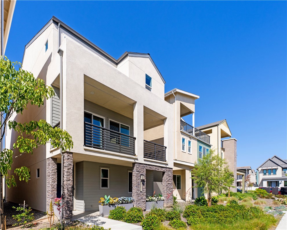 Must See! This moving-in ready house built in 2023 is located in the highly sought-after Irvine Great Park community Solis Park, 3 minutes walk to the excellent K-8 Solis Park school, and 8 minutes walk to the Outstanding Irvine 10-point "Portola High School". --an exceptional setting for families seeking both quality education and a walkable lifestyle.
The house has 4 bedrooms, 3.5 bathrooms, 2 balconies, and 2 spacious loft on the first and third floor with modern decoration; 10 feet high Ceiling. On the entry level, a private en-suite retreat awaits, complete with its own cozy sitting room and a bid side Yard, Whether hosting extended family or offering guests their own tranquil hideaway, this self-contained space balances independence and inclusion with grace. The second floor opens to an expansive, light-filled living area where the kitchen, dining, and lounge blend seamlessly. A sunlit balcony extends just beyond the living room, Step out onto the oversized balcony to take in the fresh air and stunning views. The third floor hosts a serene loft and primary suite with a spacious layout, ample closet space, and a beautifully upgraded ensuite bath featuring dual vanities and refined finishes. and the other Two additional bedrooms, each designed for comfort and style, ensuring restful nights and rejuvenating mornings. This home’s prime location is unparalleled, just steps from lush green parks and a one-minute walk to the community pool and park.
It is about 4 miles from Irvine Spectrum Shopping Center, about 12 miles to University of California, Irvine, Famous South Coast Plaza, and about 14 miles from Laguna Beach. Choose the resort-like community in the great park in Irvine. DON'T MISS IT! MUST SEE!