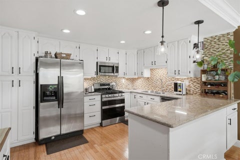 Photo of 28828 Loretta Lane, Canyon Country, CA 91387 (MLS # SR26157230)