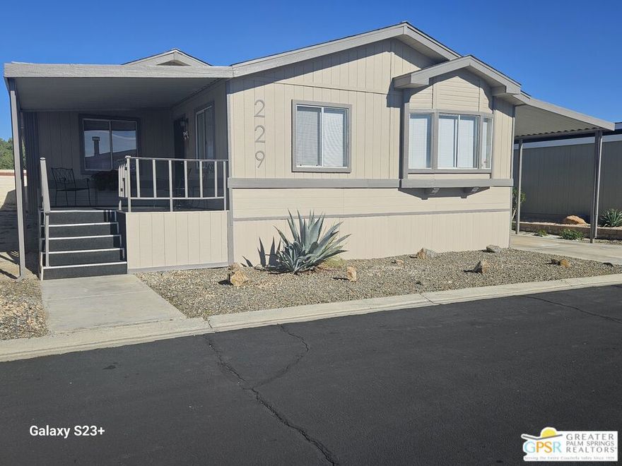WELCOME HOME to this superbly maintained 3-bedroom, 2-bathroom home is Vista Montana.  This beautiful, manufactured home on permanent foundation (433a) at 1774 sq. ft. is one of two of the largest floor plans currently on the market in the high-quality Senior Community of Vista Montana.  This home is bright with natural light in all the right places.  On entry you'll see a lovely fireplace in the large living area for those chilly desert nights.  From the living area you will meander into a sizeable formal dining area, complete with wet bar.  In the kitchen you will find an eat-in kitchen complete with breakfast bar and cabinet space galore.  The primary bedroom is quite spacious with walk-in closet, ensuite bath including garden tub, walk-in shower and double basin vanity.  The guest bed/bonus/den has double door entry and a fabulous built-in wall unit for all things entertainment.  The secondary bedroom is good in size with ample closet space.  The roof is 4 years young; the entire HVAC system was replaced three years ago.  The backyard is fenced, complete with two storage sheds with plenty of space left for Fido.  The laundry is inside yet separate with more storage/cabinet space.  Vista Montana community has many amenities including pool, spa, sauna, billiards & card room, BBQ, clubhouse, gate guard and more.  This is desert resort style living at its best.  COME SEE!