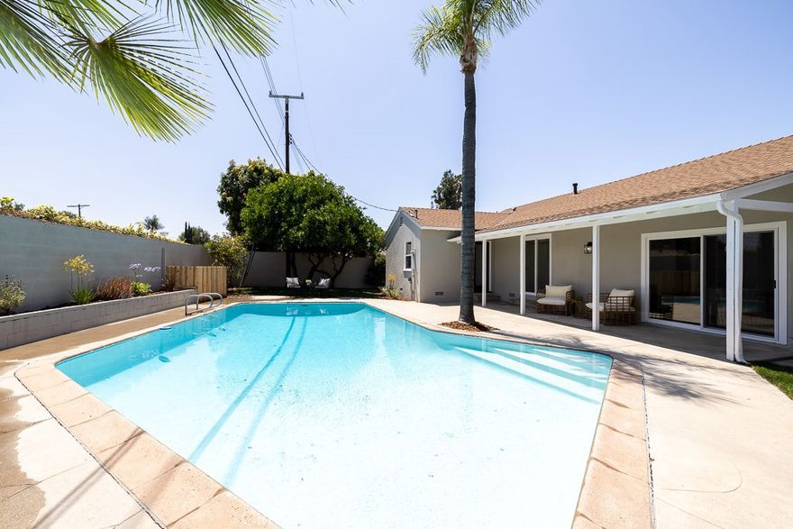 Stylishly Renovated Pool Home in Winnetka



Welcome to 7830 Fairchild Ave — a 4-bedroom, 2-bathroom home redesigned by Maverick Design. This approximately 1,704 sq ft residence sits on an 8,442 sq ft lot and features a private backyard with a sparkling pool.



Interior upgrades include new wide-plank wood flooring and an open-concept layout. The remodeled kitchen features wood cabinetry, designer finishes, and is equipped with stainless steel appliances including a refrigerator, custom microwave, dishwasher, and freestanding range. The primary suite includes a newly renovated en-suite bathroom with a large walk-in tile shower. The hall bathroom has also been updated with a custom wood vanity and new tile finishes.



The backyard is ideal for outdoor living, featuring a spacious layout and a swimming pool — perfect for relaxing or entertaining. Conveniently located near parks, shopping, and schools.