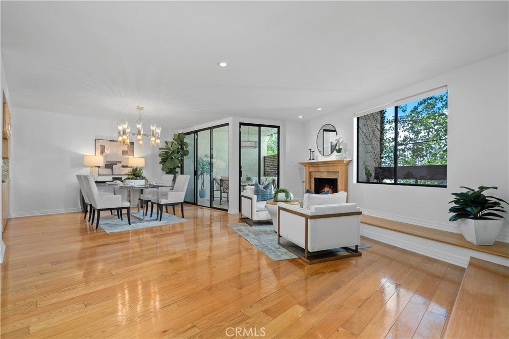 Photo of 11687 Bellagio Rd #12, Los Angeles, CA 90049 (MLS # OC26041181)