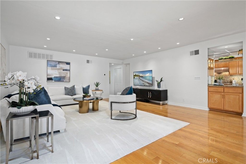 Photo of 11687 Bellagio Rd #12, Los Angeles, CA 90049 (MLS # OC26041181)