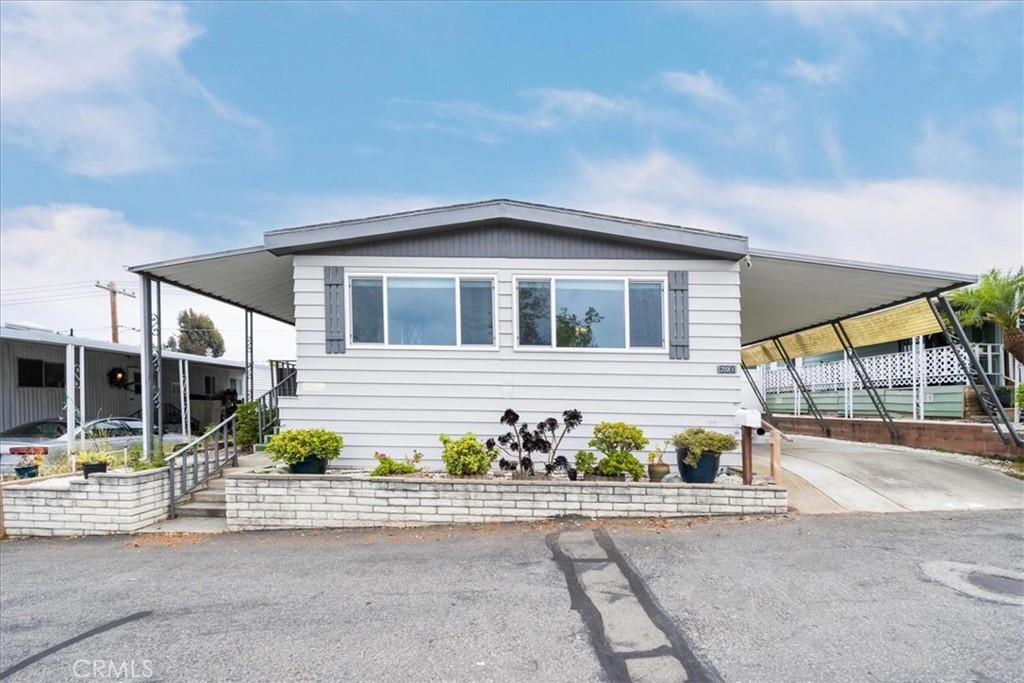 PRICE REDUCTION! Charming 2 Bed, 2 Bath Home in Rent-Controlled 55+ Oceanside Community – Just 5 Miles from the Beach!
Welcome to this beautifully maintained 2-bedroom, 2-bathroom home located in one of Oceanside’s most desirable and affordable rent-controlled communities.
Inside, you'll find a thoughtfully updated interior with newer kitchen cabinets, dual pane windows for added efficiency, and a brand-new energy-efficient AC system—perfect for warm Southern California days. The spacious layout provides a comfortable and functional living space with plenty of natural light.
Step outside and immerse yourself in the park’s stunning landscaped grounds, featuring a large, tranquil pond, complete with a gazebo, flowers, walking paths, and charming bridges—a perfect place to relax and just walking distance from the property!
The community offers an impressive list of amenities, including a clubhouse, swimming pool, car wash, RV and boat parking, a retail store, and even a resident food program. Full termite inspection just completed- Termite Clearance!