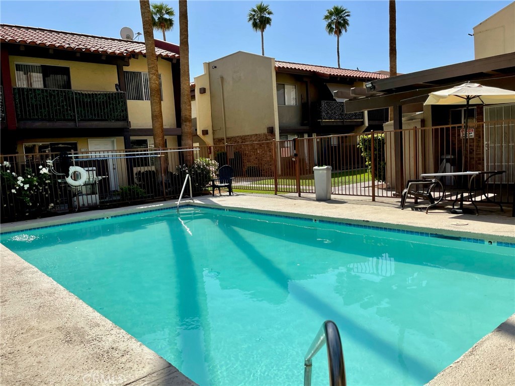 Large 2 bedroom, 1.5 bath, 2 story townhouse is located at La Quinta Courtyard Townhomes is located at Eisenhower and Calle Tampico This unit is being remodeled with tile floors downstairs, new carpeting upstairs, new paint, new appliances including stove, microwave, refrigerator and dishwasher. Additionally, it has vaulted ceilings, central air conditioning, and new hardware including faucets, towel bars, fixtures, and mini blinds. The property itself has been renovated with all-new parking lots, all-new landscaping, new exterior lighting, new pool equipment, and new laundry facilities. The complex is security-gated with new on-site management. Unit is available for yearly lease or longer. Lots of parking, 24-hour security system. On-site management, on-site laundry facilities BBQ area.