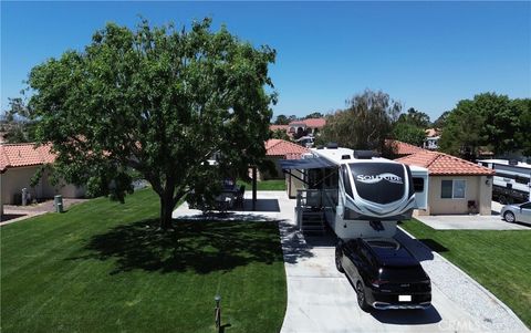 Photo of 11574 Ridgemark RD, Apple Valley, CA 92308 (MLS # HD26098925)