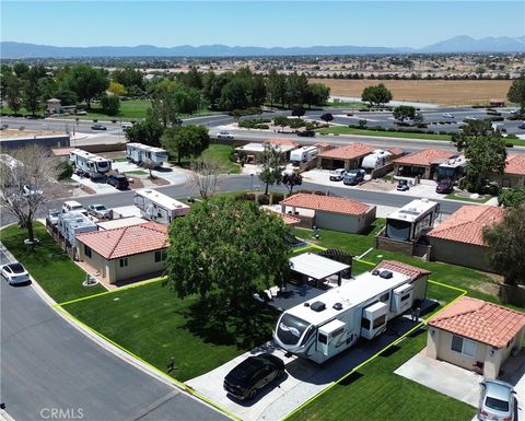Photo of 11574 Ridgemark RD, Apple Valley, CA 92308 (MLS # HD26098925)
