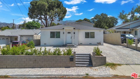 Photo of 10930 Eldora Avenue, Los Angeles, CA 91040 (MLS # 26933221)