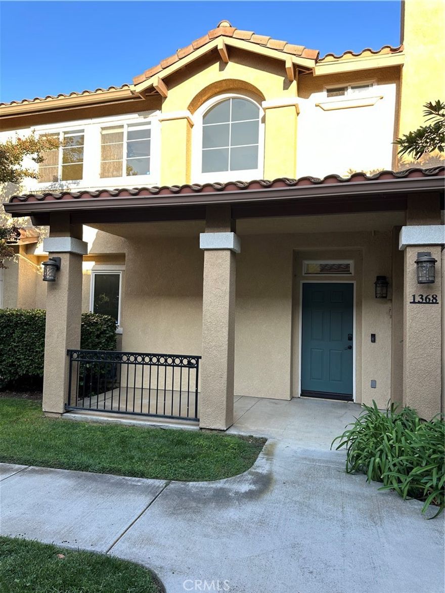 Available for immediate move-in! Gorgeous 3 bedroom + 2 ½ bathroom townhome for rent in ideal Newbury Park location. Beautifully remodeled with brand new designer flooring and paint throughout. This corner unit is spacious and has lots of natural light. Kitchen has quartz counters, soft close cabinets, upscale lighting, a full pantry with pull out drawers, stainless steel appliances including a refrigerator and brand new GE 5 burner stove. Cheerful living room with fireplace and dining room with sliders leading to the patio. Upstairs are 3 bedrooms and the laundry room with washing machine and dryer included. The primary suite has an attached bathroom with dual sinks, both shower and soaking tub, and walk-in closet. The two secondary bedrooms have plenty of natural light and share the hall bathroom. Large stamped concrete patio is perfect for entertaining and is surrounded by fruit trees and grapevines, with views of lush greenbelts. Attached 2 car garage with direct access to the kitchen. Dual paned windows and central A/C. Community pool/spa and open green areas.
