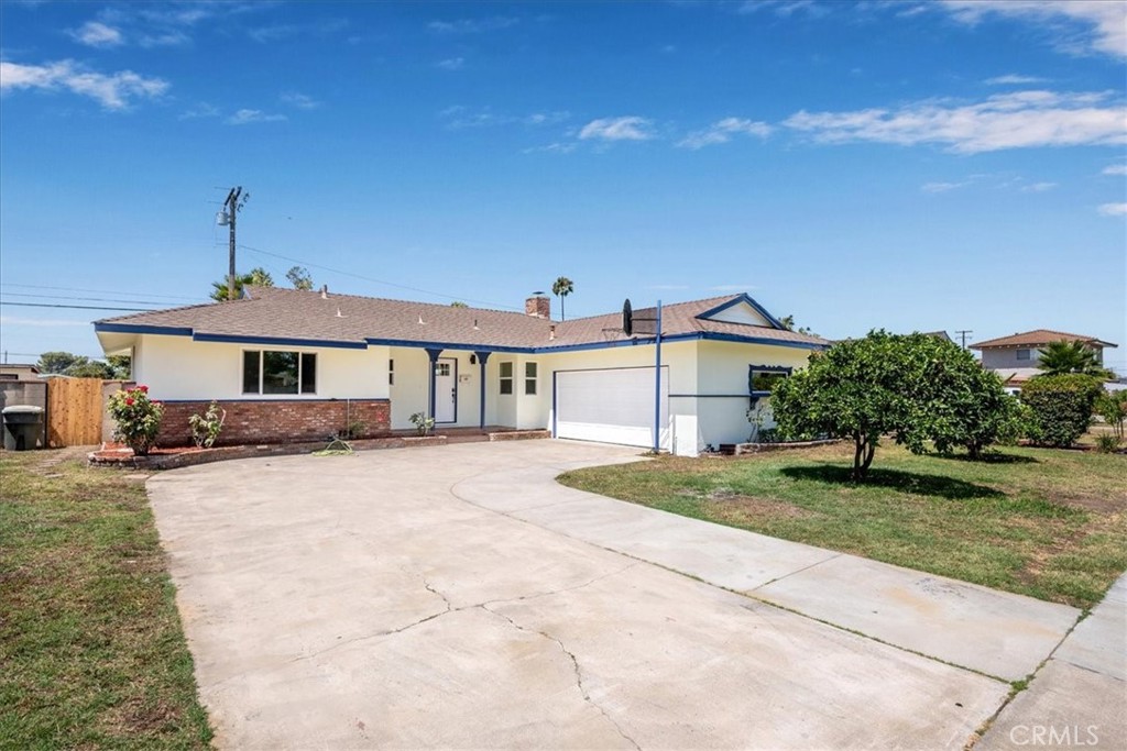 Welcome to your dream home in the heart of Garden Grove! This beautifully remodeled 4-bedroom, 3-bathroom pool home combines modern comfort with timeless style. Situated on a spacious lot in a quiet, family-friendly neighborhood, this home offers the perfect blend of indoor and outdoor California living. Step inside to discover an open-concept layout with new luxury vinyl plank flooring, recessed lighting, and fresh interior paint throughout. The chef’s kitchen is a true standout, featuring custom cabinetry, quartz countertops, and stainless-steel appliances. The primary suite is your personal retreat with custom finishing touches in En Suite bathroom and a dual vanity sink. Three additional bedrooms provide plenty of room for family, guests, or a home office. The two additional bathrooms have been tastefully updated with modern vanities and high-end fixtures. Step outside to your private backyard oasis with a sparkling pool, perfect for entertaining, relaxing, or soaking up the sun. A covered patio and lush landscaping complete the outdoor space. Additional features include: EV outlet, updated electrical & plumbing, new heating/air ducting, landscape sprinklers, no neighbors in the back. Swing by today and put in your offer before the summer ends!