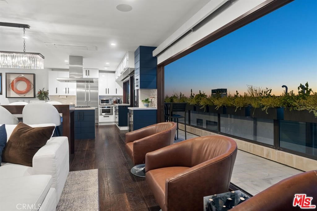Step into the best of beachside living with this fully furnished home located in the heart of Manhattan Beach. This custom-designed residence offers a perfect blend of modern upgrades and relaxed coastal charm — ready for you to move in and start enjoying immediately.
Inside, the open and bright layout features high-end finishes throughout, including beautiful designer tile and thoughtful custom details. The top floor highlights a chef’s kitchen with quartz countertops, Thermador stainless steel appliances, and an ocean-inspired backsplash. It flows effortlessly into a spacious living area with panoramic views stretching from Palos Verdes to Malibu.
Enjoy the ocean breeze from your private balcony, made accessible by large accordion doors that bring the outdoors inside. Additional features include a convenient downstairs laundry room with extra storage.
Don’t miss this rare opportunity to lease a furnished, move-in-ready home in one of Manhattan Beach’s most desirable locations — just minutes from the sand, dining, and shops.