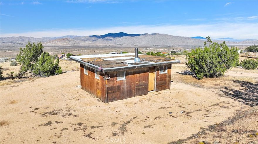 VIEWS !!  Shared water well and electricity on the property.  This cabin can be fixed up, built up or you can start fresh.  Take Round Up to Belfast and the property will be on the corner of Belfast and Valley View.