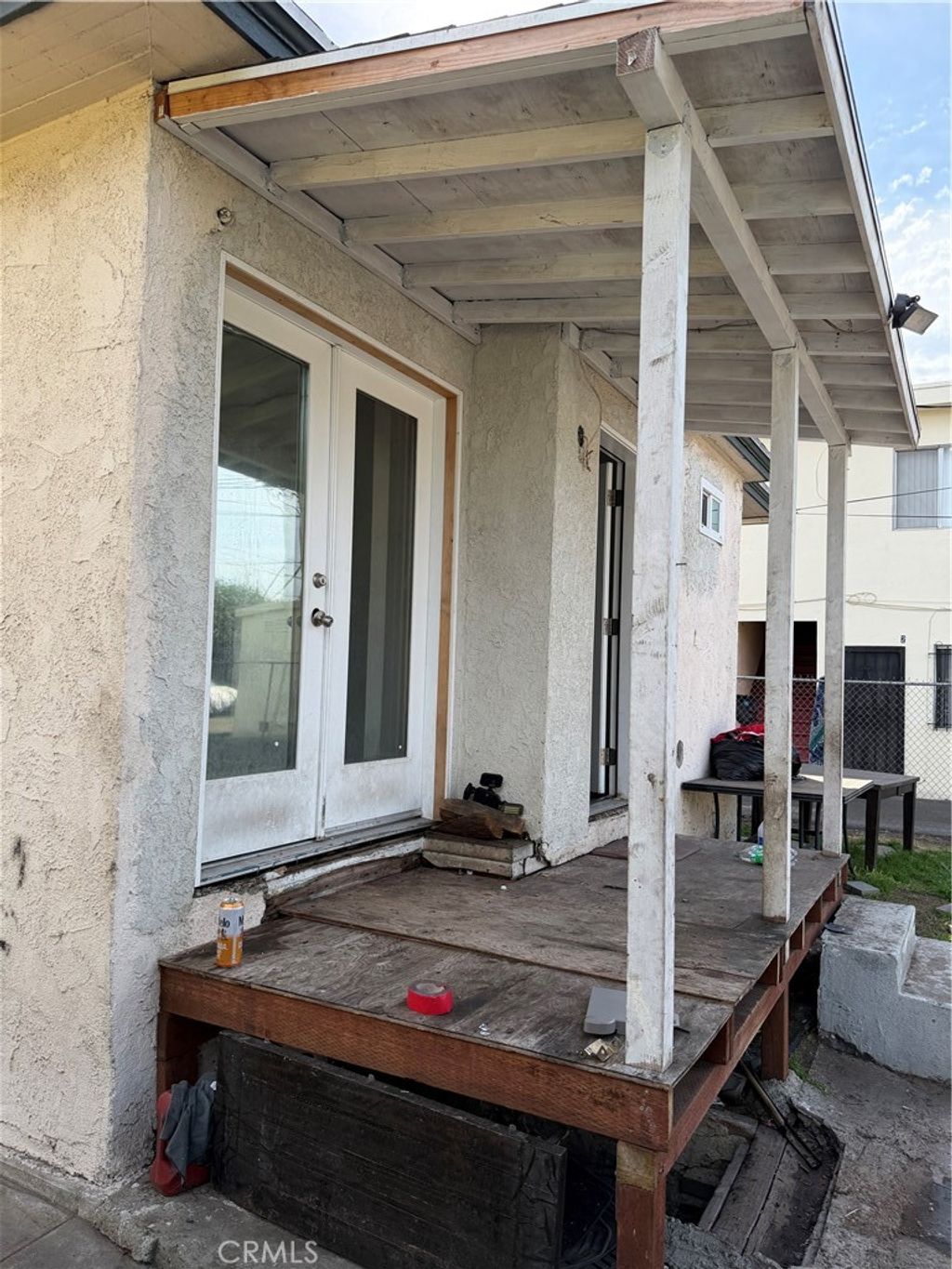 Photo of 6915 Bonsallo, Los Angeles, CA 90044 (MLS # DW26038366)