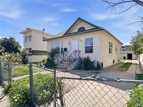 Photo of 6915 Bonsallo, Los Angeles, CA 90044 (MLS # DW26038366)