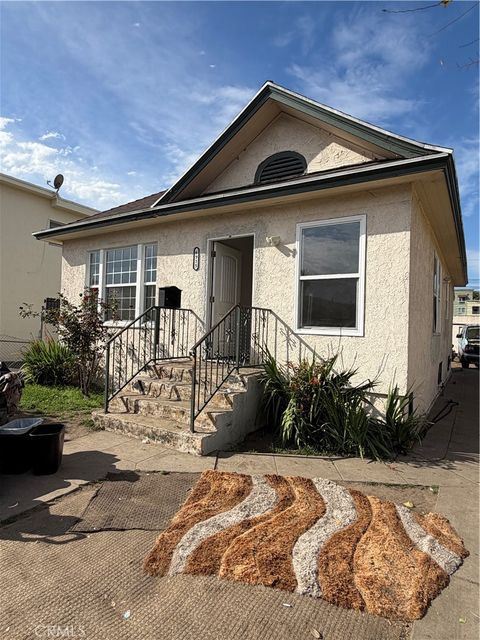 Photo of 6915 Bonsallo, Los Angeles, CA 90044 (MLS # DW26038366)