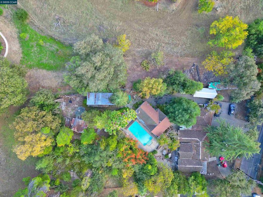 Contractor/Developer/Investor Opportunity! For the first time ever, this property is available on the market. Situated on a generous .68-acre lot in the premier Walnut Heights neighborhood, this rare offering is designated for two or more homes on one parcel. The property currently includes a main residence of approximately 2,070 sq ft, a secondary residence of roughly 1,600 sq ft, and a converted garage. Please note: the main home and converted garage are in significant disrepair and may or may not be salvageable. This is an exceptional chance to reimagine the space and create your ideal living or development scenario in one of Walnut Creek’s most desirable neighborhoods. The adjacent property has already been rezoned for development, opening the door to numerous possibilities. Endless potential awaits!