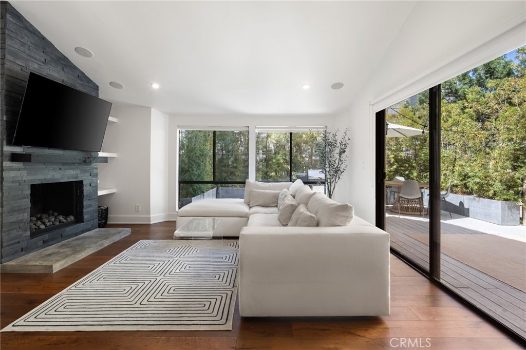 This spacious 1,936 sq ft townhome blends modern comfort with timeless style and a rare lakeside lifestyle. Featuring 3 bedrooms and 2.5 bathrooms, this turnkey home has been thoughtfully updated with hardwood floors throughout, abundant storage on every level, and multiple indoor-outdoor living spaces.
The entry level offers a welcoming mudroom area with direct access to the garage and the carport with EV charging, and a full laundry room with extra storage. Upstairs, the main living level features an open living room with a cozy fireplace and sliding doors to a private patio - perfect for relaxing or entertaining.
On the next level, the bright kitchen includes bar seating, a new refrigerator, and opens to a dining area and a cozy second living room-style space with access to a sunny balcony, ideal for morning coffee or evening cocktails.
All bedrooms are generously sized, featuring a combination of built-in storage and his-and-hers walk-in complemented by fully updated bathrooms. The garage provides built-in shelving and a workbench for additional organization and storage.
Located within walking distance to top restaurants, grocery stores, parks, and the local farmers market, this home offers the perfect blend of convenience, community, and quiet retreat.
Residents enjoy beautifully maintained amenities including two pools, three docks, a fitness center, and a renovated clubhouse with kitchen, pool table, and event space. The HOA covers water, trash, exterior maintenance, Wi-Fi, cable, and insurance — plus exclusive private lake access with a shared boat and dock which is a 2 minute walk from your front door, creating a true resort-style living experience.
