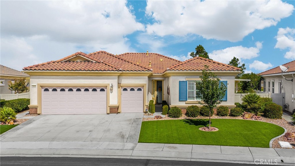 Enjoy peaceful Golf Course Living in the desirable Sun City 55+ Community. Located on the 2nd Green of the 27 hole Ashwood Golf Course. This completely remodeled 2 bedroom, 2.5 bathroom residence offers upscale living in this beautiful 55+ community, combining comfort, luxury, and breathtaking views in every direction. You will be immediately impressed upon entering this contemporary home with open-concept floor plan, perfect for both relaxing and entertaining. Newer luxurious hardwood flooring throughout, 5" baseboards, plantation shutters, ceiling fans, and crown molding in every room! The primary bedroom is generously sized with carpet, custom paint, plantation shutters, crown molding, and ceiling fan. Attached is the primary bathroom with dual sinks, walk-in closet, separate shower and tub. The Junior Suite is complete with carpet, custom paint, plantation shutters, crown molding, and ceiling fan, AND attached Junior Suite bathroom. The third room is currently used as an office, but is also perfect for a gym, study, or media room. The chef-inspired kitchen is spacious and has tons of cabinet storage, counter space, is well-lit, and open to the dining room & living room. The living and dining rooms have large windows with unobstructed views of the golf course and desert hills. French door passage to the back covered patio located off the living/dining area. Greeting you out back are 2 separate covered patios for relaxing, BBQing, and entertaining while enjoying fresh air & panoramic views. The spacious laundry room with huge wash sink and 3 car garage with dedicated golf cart space complete this fantastic home. This Sun City Community allows you to enjoy the best of active adult living with access to community amenities including a sparkling pool and spa, sport courts, a clubhouse, and an on-site restaurant.